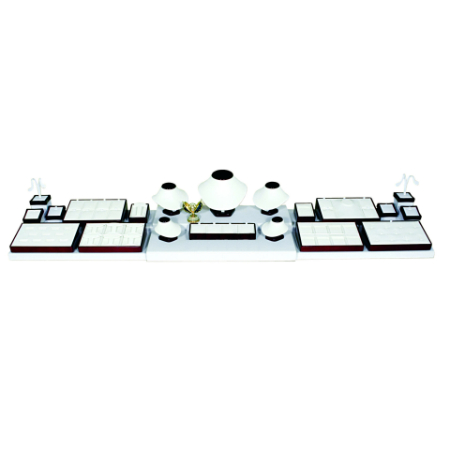 A white table with several different colored tiles.