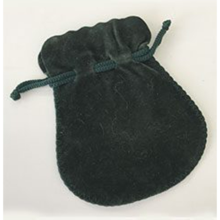 A black velvet bag with a bow on top of it.