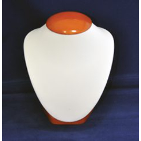 A white and orange urn sitting on top of a blue table.