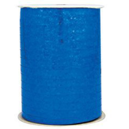 A roll of blue ribbon on top of a white table.