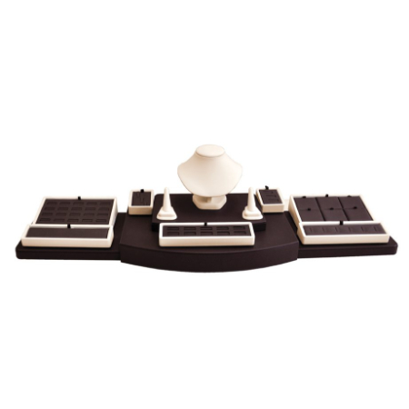 A black and white desk set with a hat on top of it.