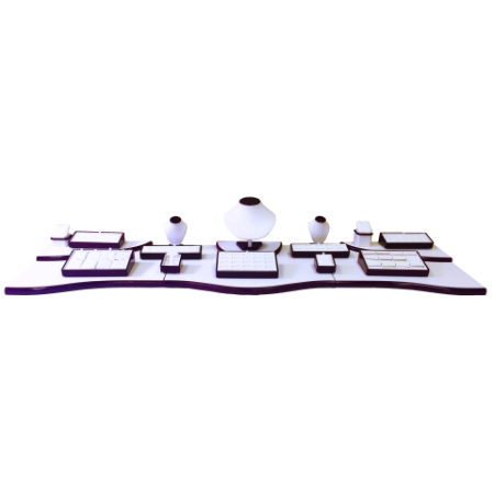 A purple and white tray with some shapes on it