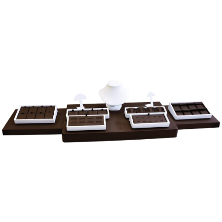 A chocolate tray with four different trays on it.